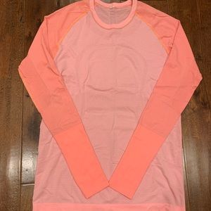 lululemon swiftly pink and coral orangish colored long sleeve workout top